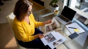 Homeowner comparing handyman service alternatives