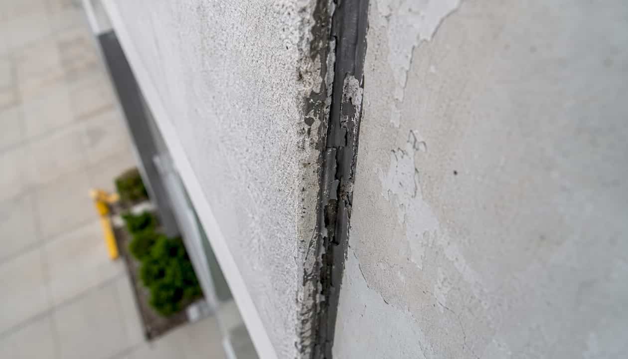 Close-up of failing caulk joint adhesion