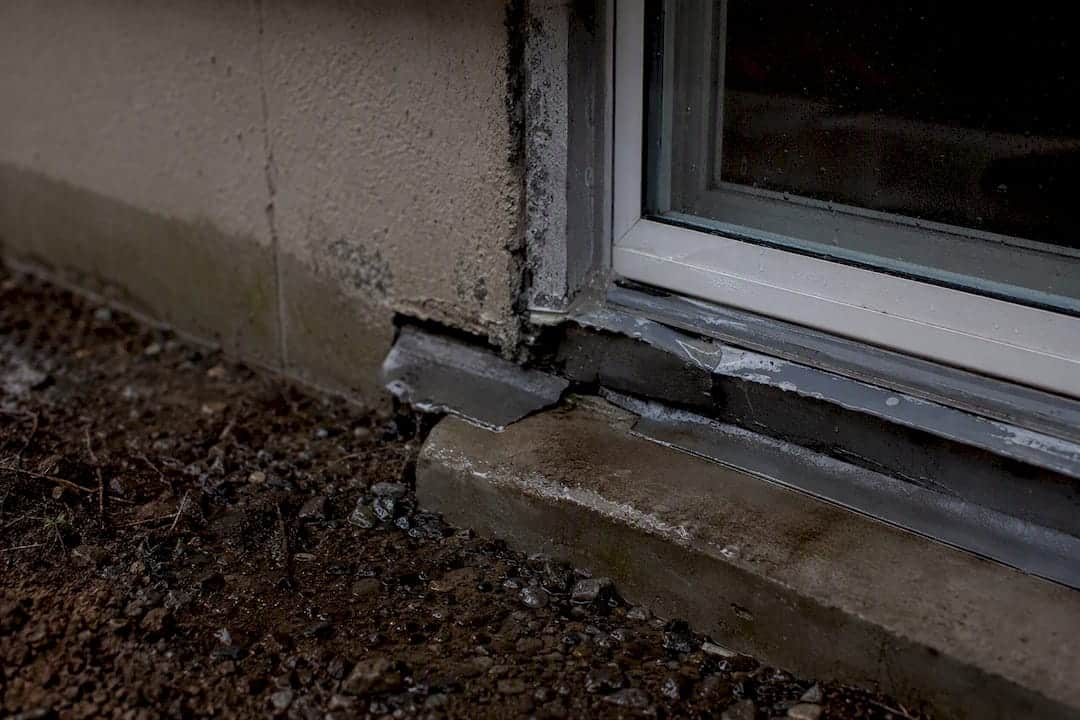 Damaged flashing at basement window sill