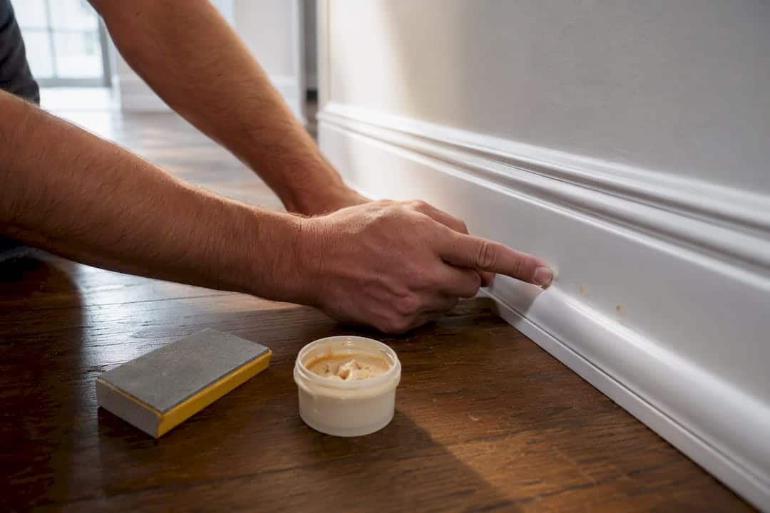 Filling nail holes in shoe moulding